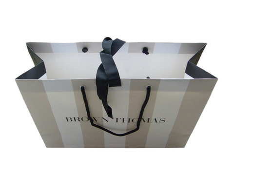 comprar Negócio de papel impresso costume do saco da mercadoria da ordem que empacota em linha com ilhó online manufacture